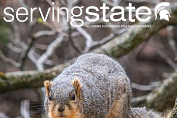 Serving State cover image of squirrel on campus