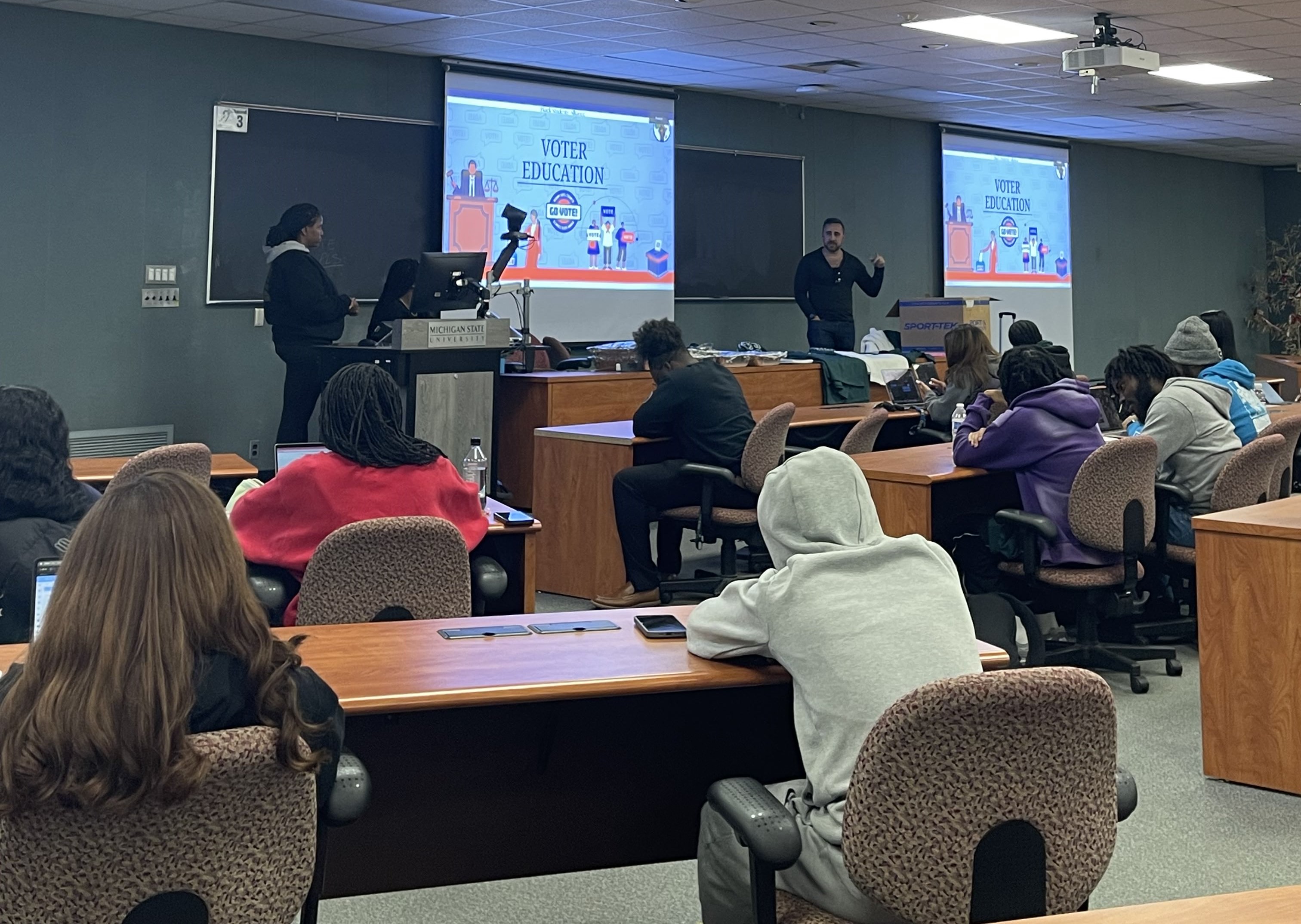 Students listen to a speaker at a MSU Voter education event.