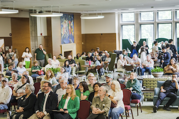 Attendees gathered during remarks at the MSU Union Centennial celebration.
