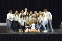 MSU Fraternity and Sorority Life members gather on stage for a celebratory photo during Greek Week