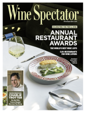 Wine Spectator magazine front cover featuring a glass of white wine and a dish of food